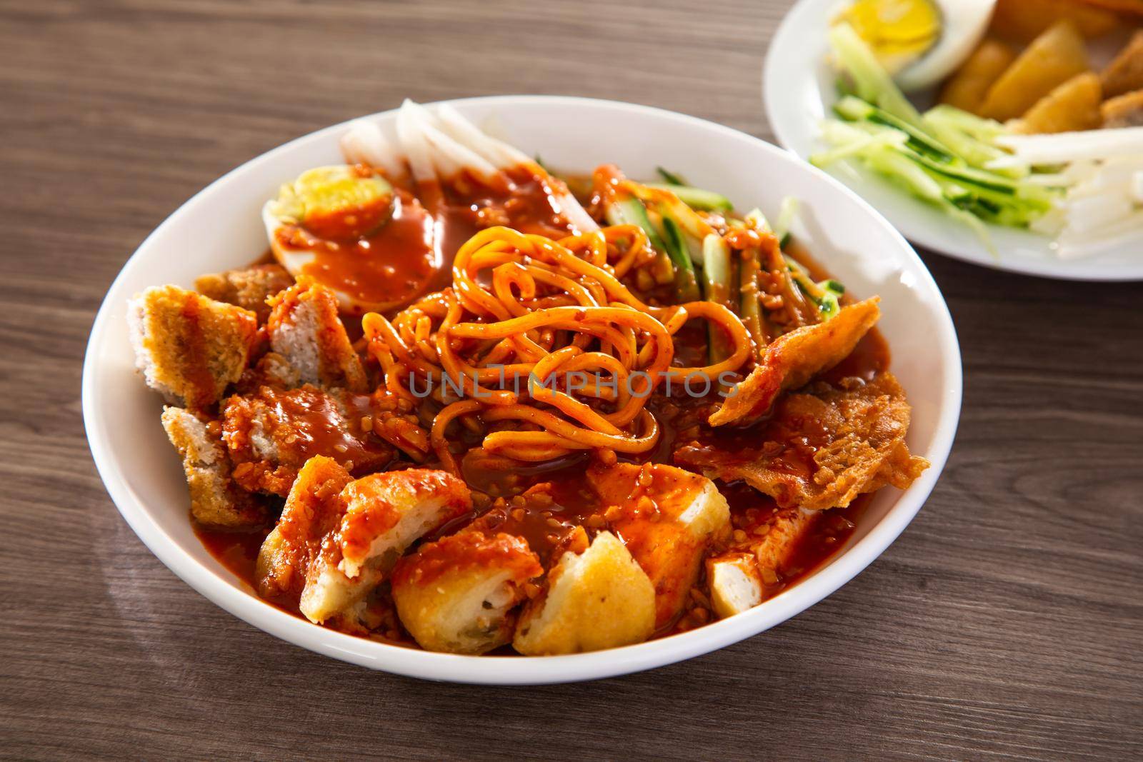 Mee Rojak is Malaysia Indian food of noodle with peanut sauce. One of very famous food in asia.