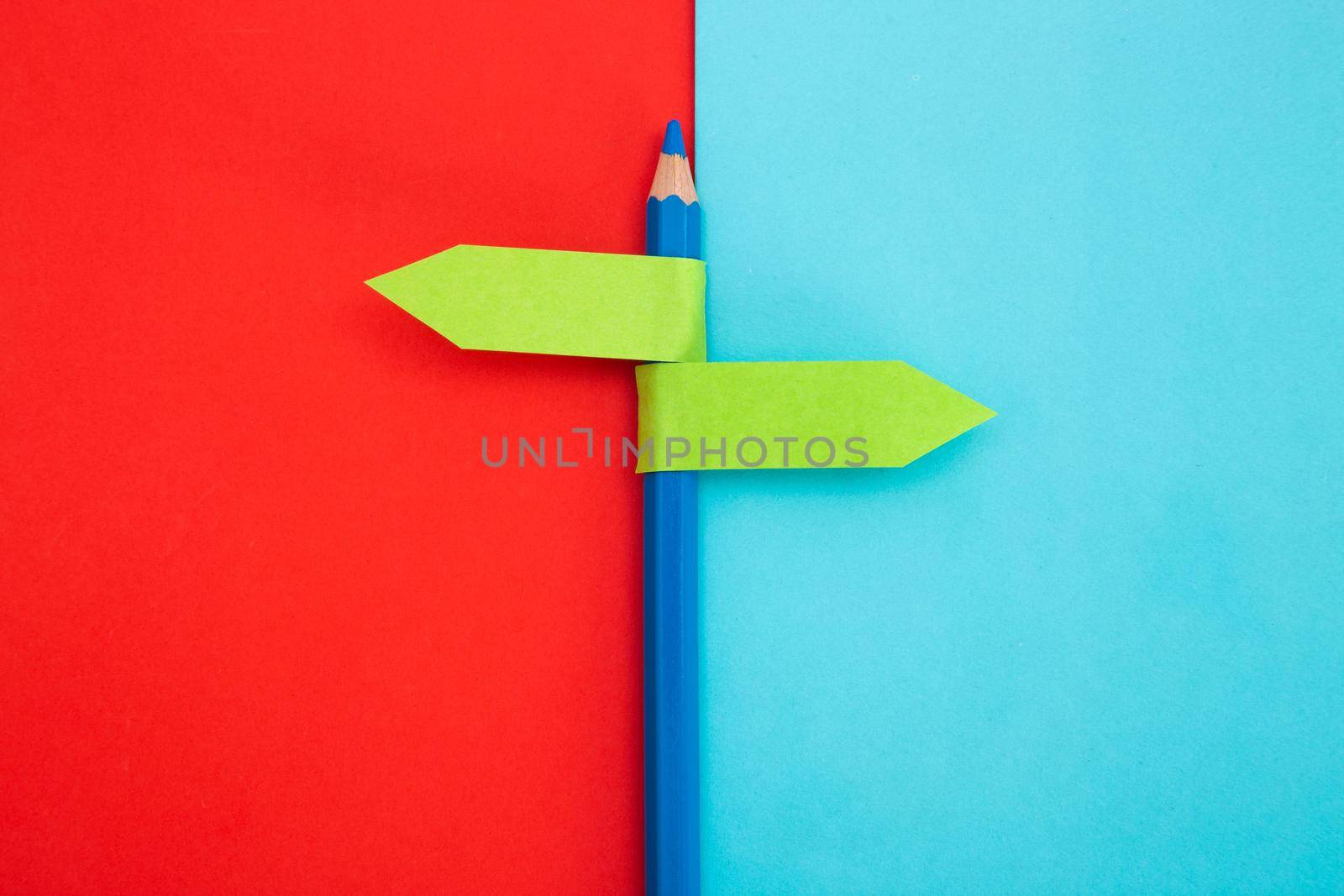color pencil with direction indicator on color background