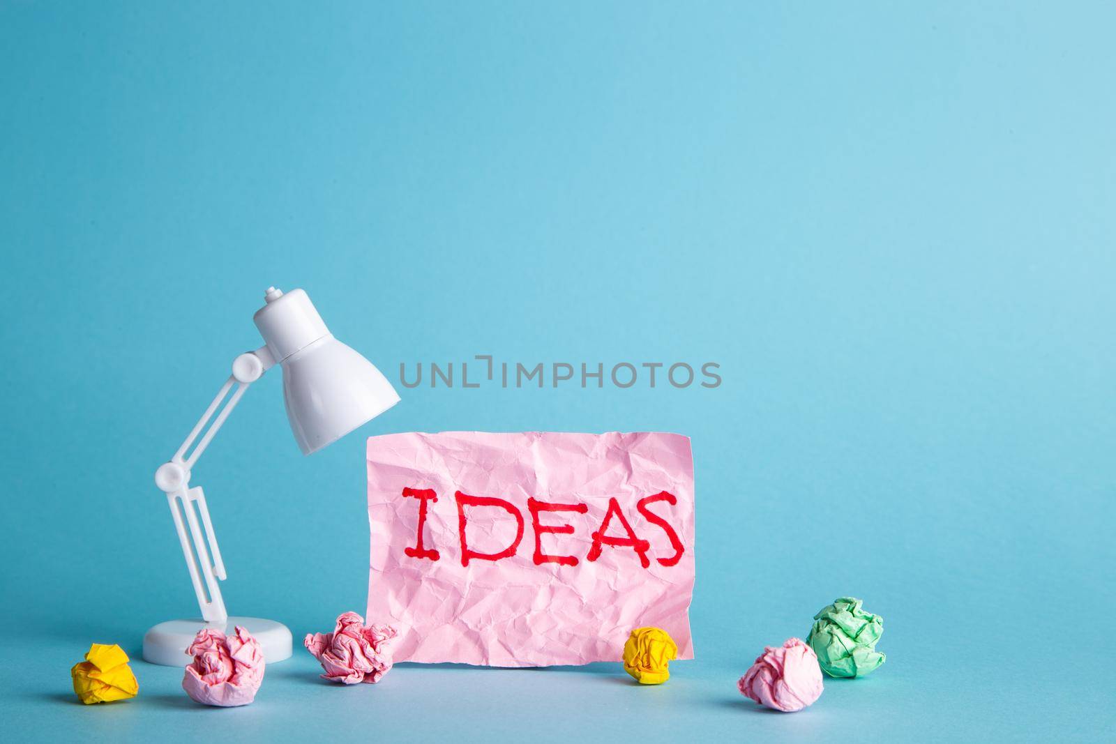 Ideas of creativity concepts with paper crumpled ball and lamp. Business solution