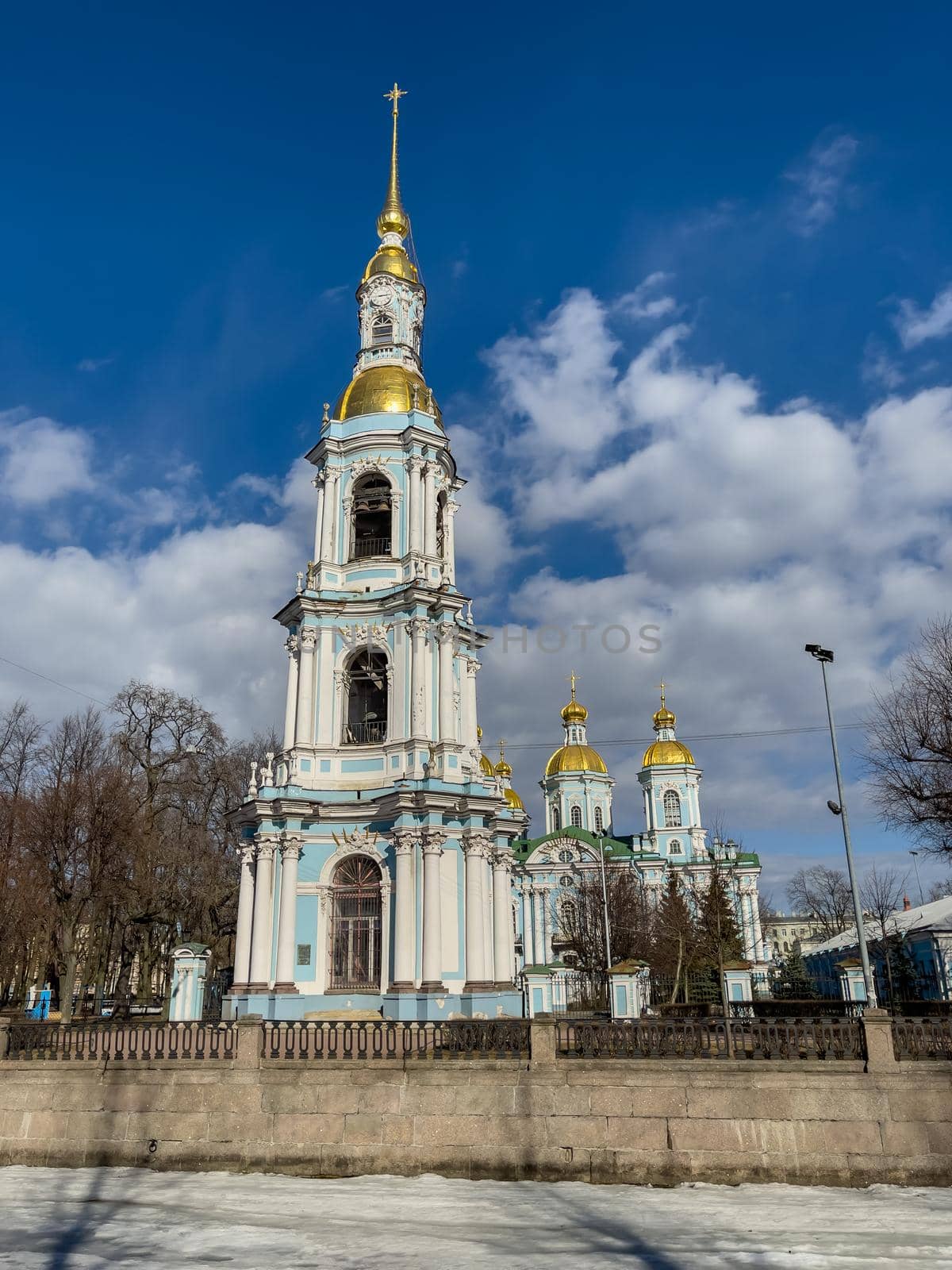 Close up view of St. Nicholas Naval Cathedral belltower in a clear sunny day of spring by vladimirdrozdin