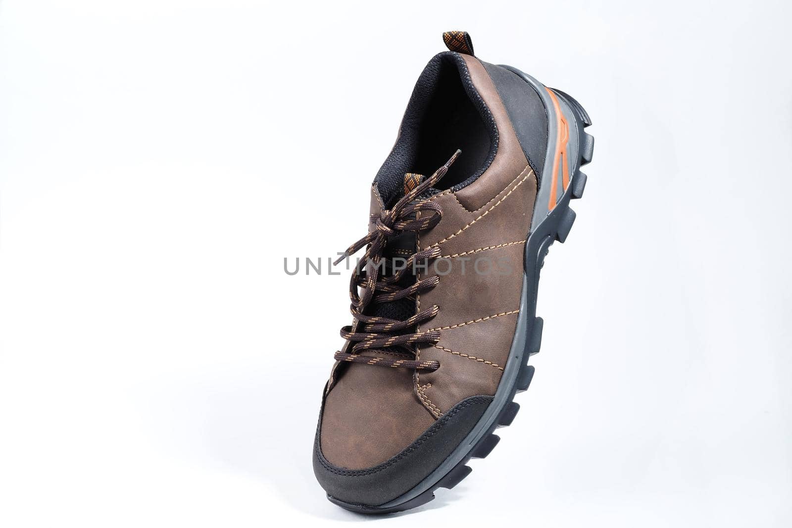 Men's shoes. Fashionable men's shoes or sneakers in isolation on a white background, levitation. High quality photo