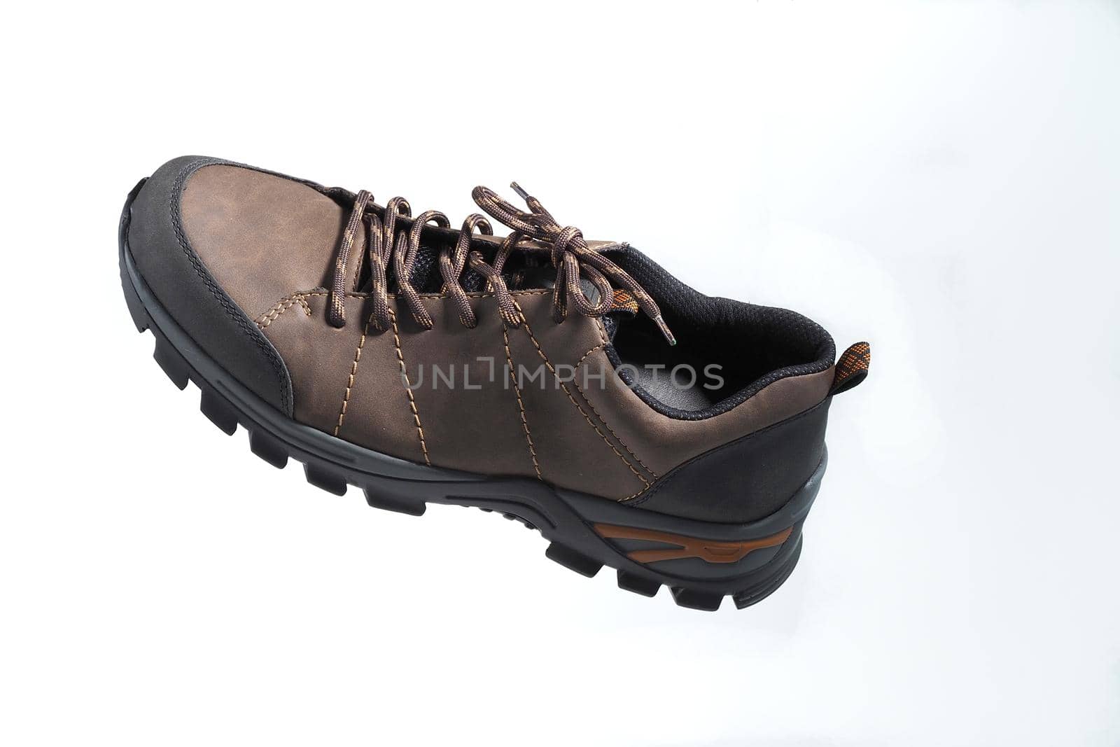 Men's shoes. Fashionable men's shoes or sneakers in isolation on a white background, levitation. High quality photo