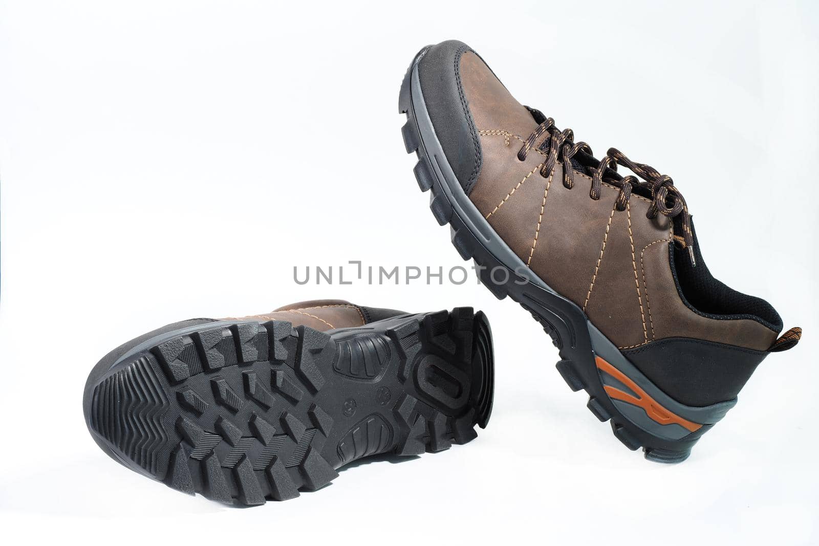 Men's shoes. Fashionable men's shoes or sneakers in isolation on a white background, levitation. High quality photo