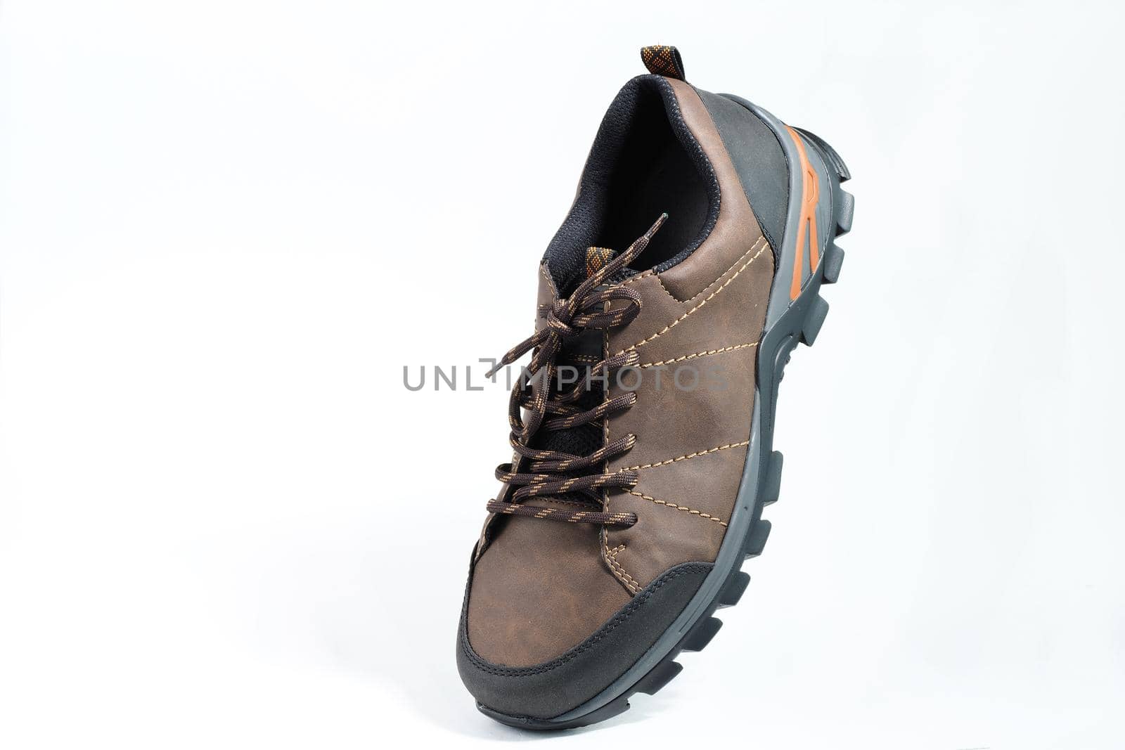 Men's shoes. Fashionable men's shoes or sneakers in isolation on a white background, levitation. High quality photo