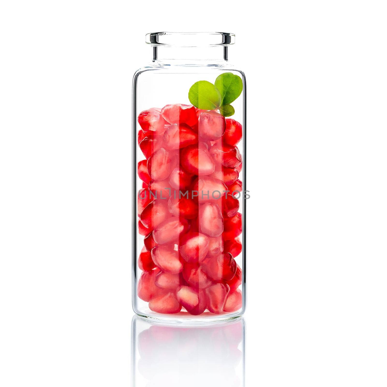  Homemade skin care with pomegranate seeds in a glass bottle  isolate on white background.