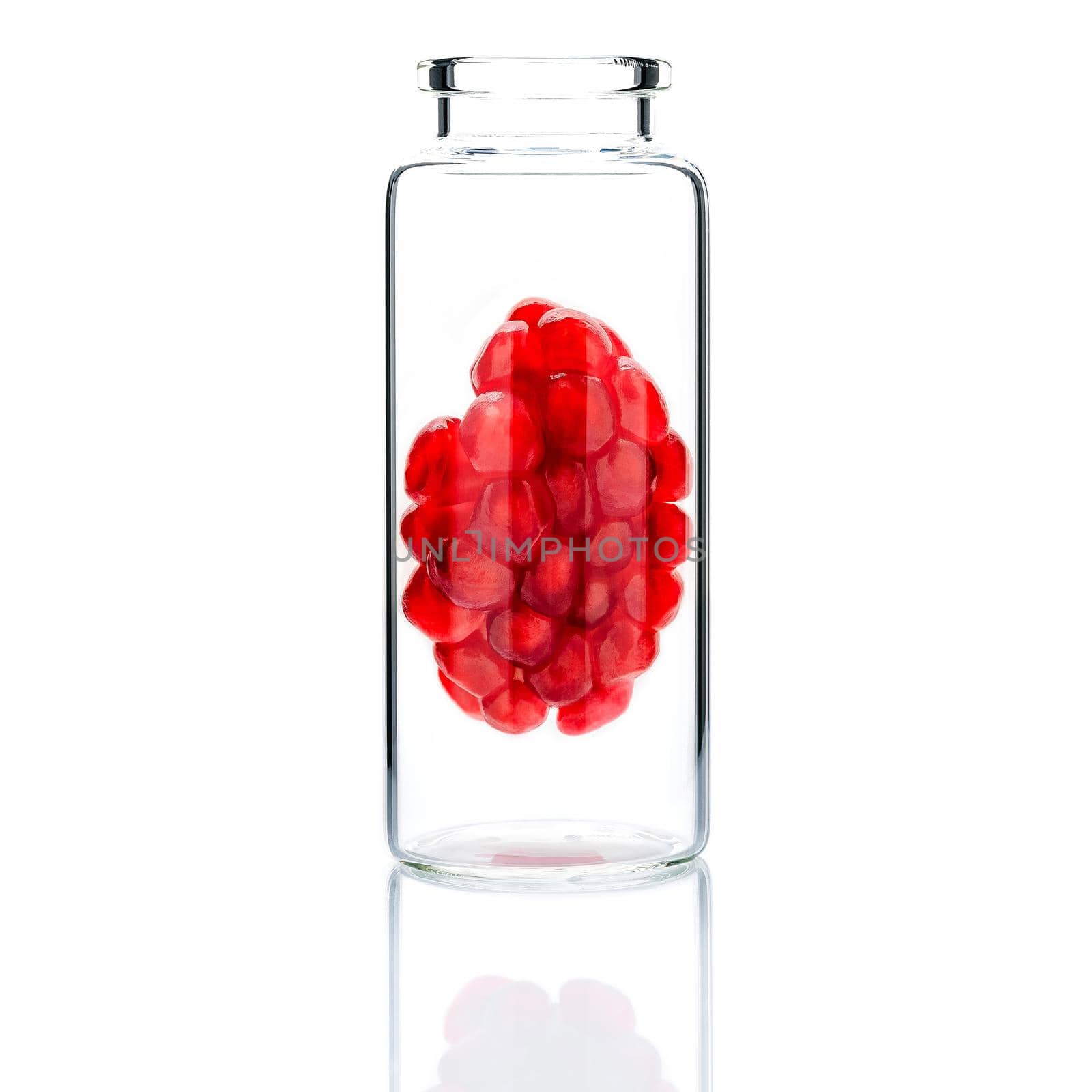  Homemade skin care with pomegranate seeds in a glass bottle  isolate on white background. by kerdkanno