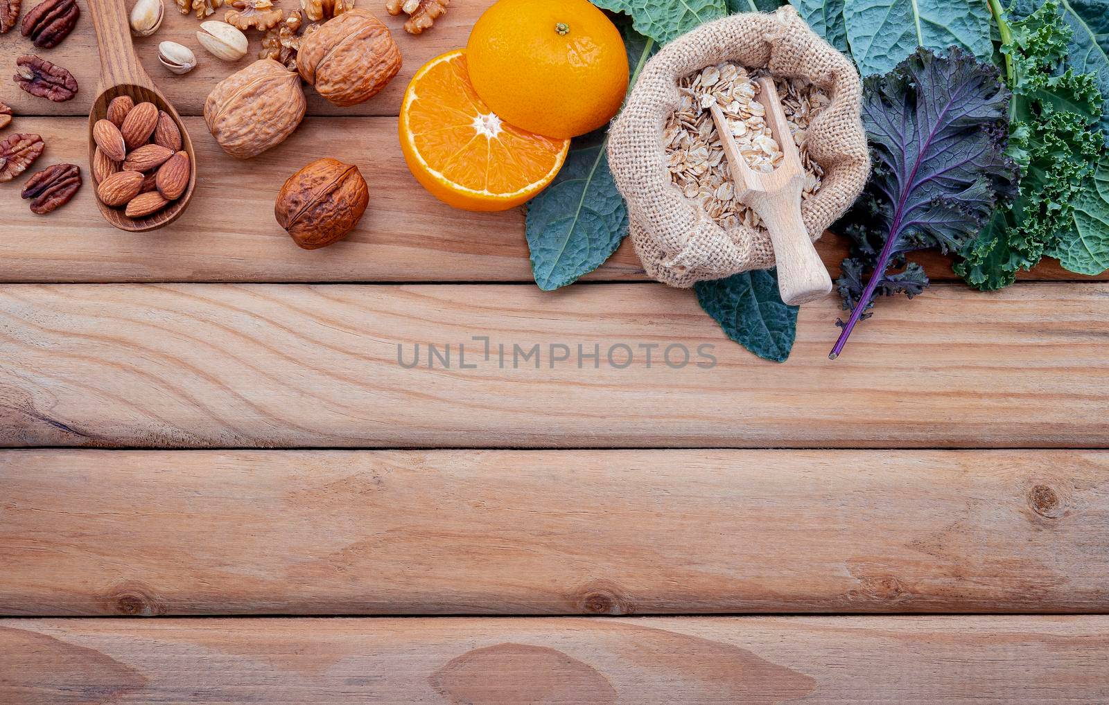 Ingredients for the healthy foods selection. The concept of healthy food set up on shabby wooden background. by kerdkanno