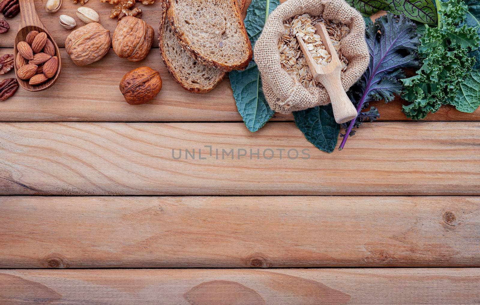 Ingredients for the healthy foods selection. The concept of healthy food set up on shabby wooden background. by kerdkanno
