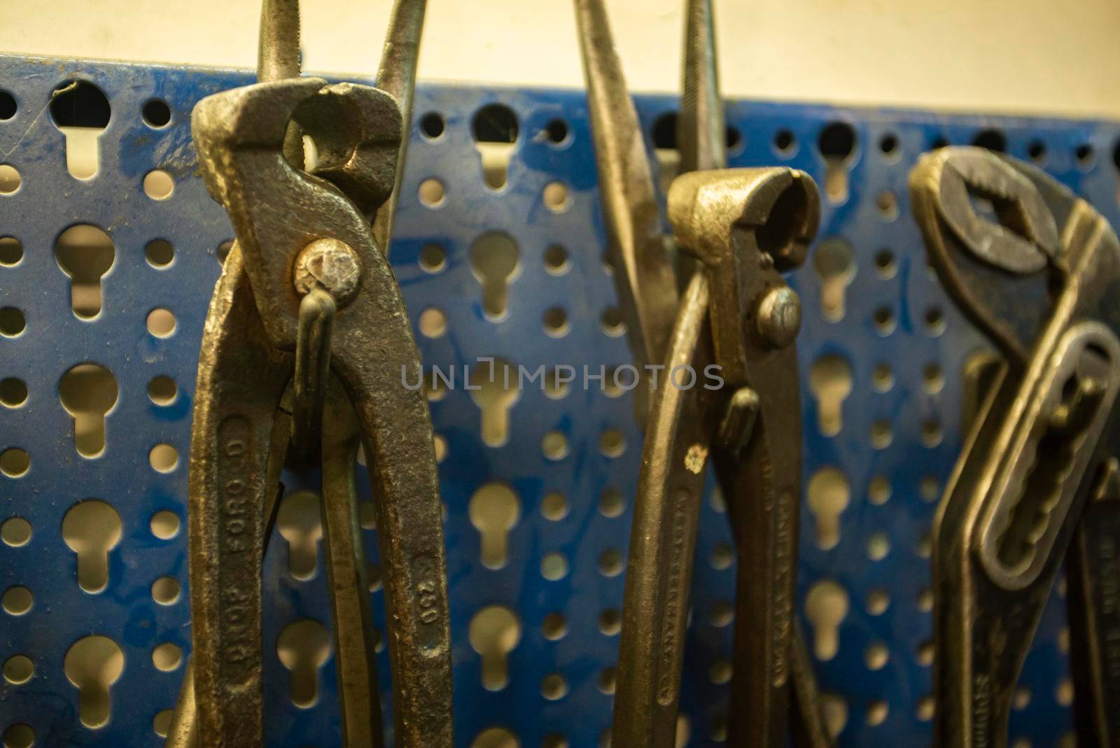 MILAN, ITALY 28 MARCH 2021: Tools hanging in the workshop