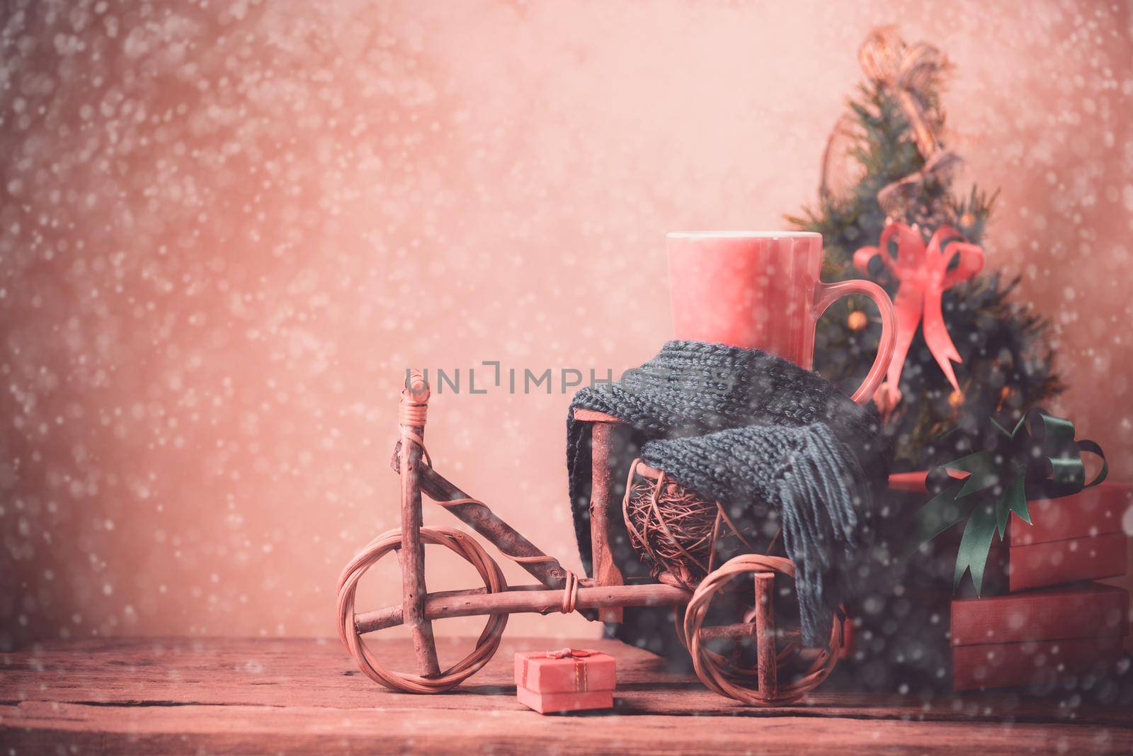 Christmas decoration object on wood car. Christmas holiday celebration concept,Rose gold color filter