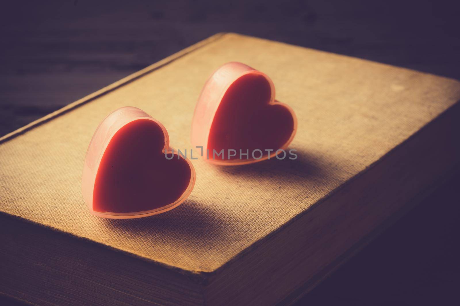 Couple heart is candles on dark background