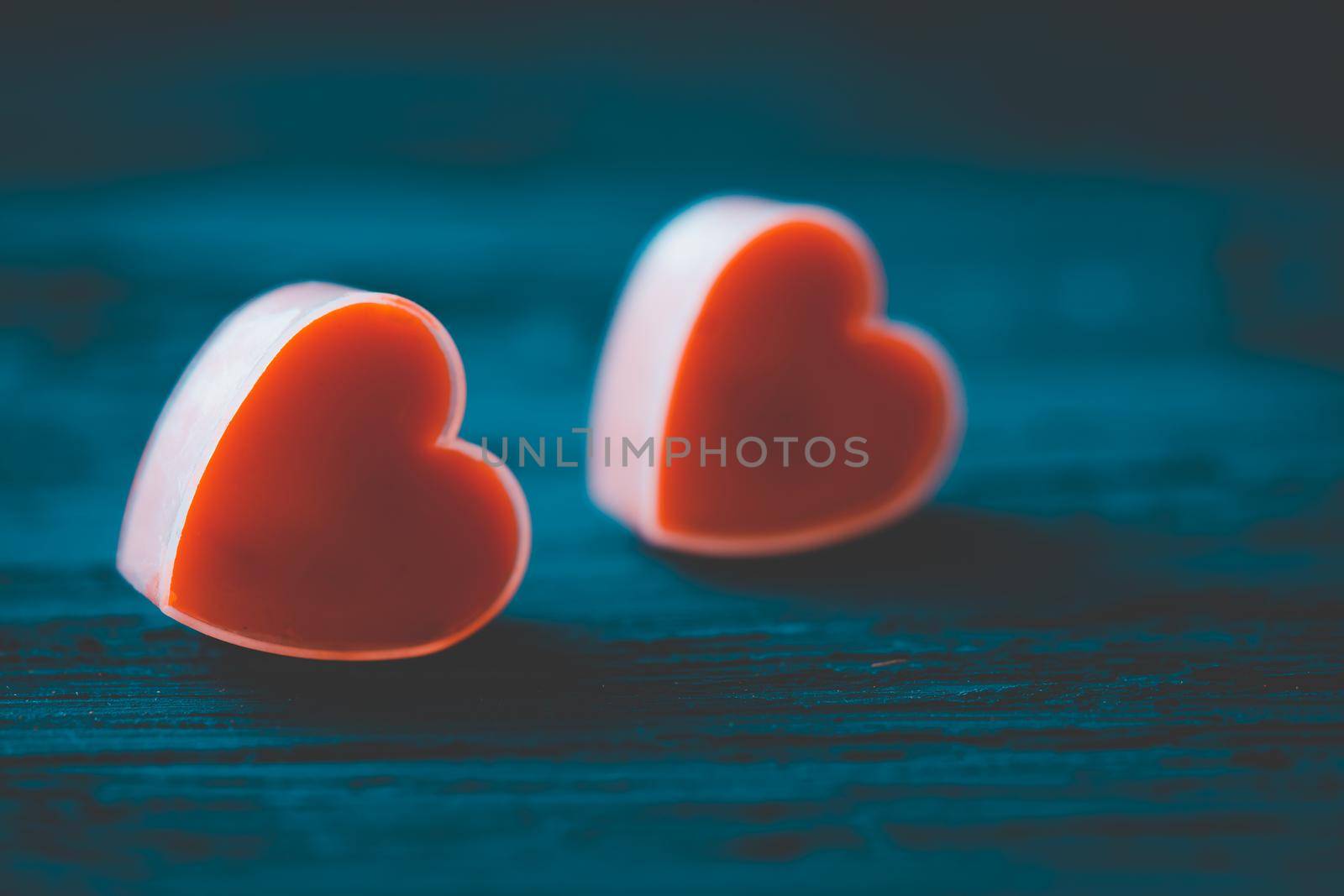 Couple heart is candles on dark background