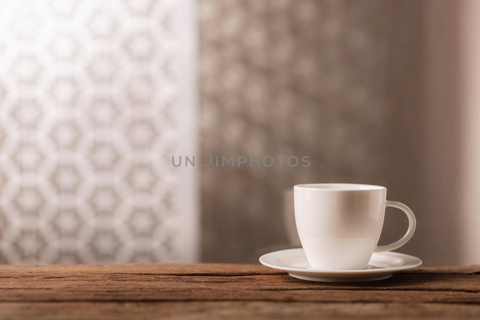 White cup of coffee by Wasant