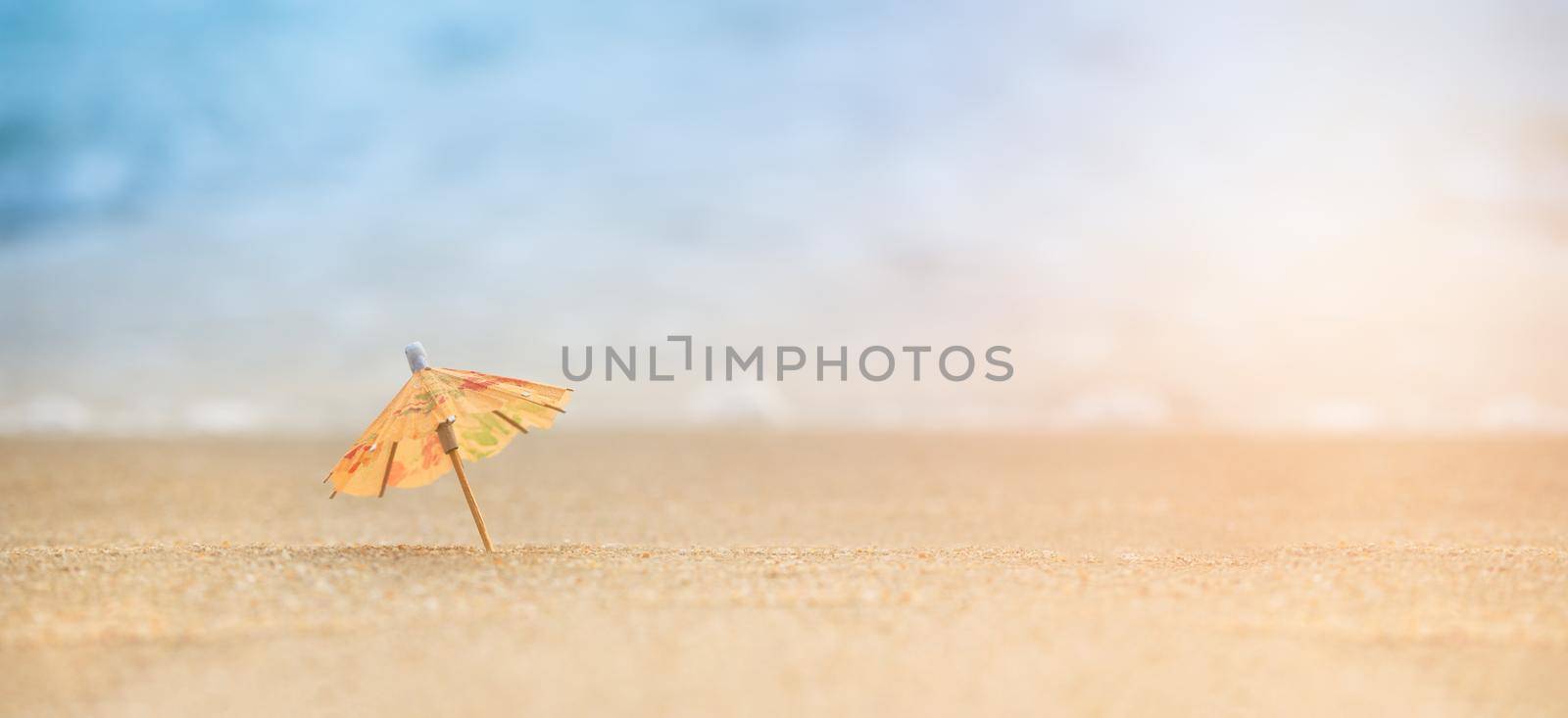 Beach mini umbrella with copy space, Summer on the beach concept