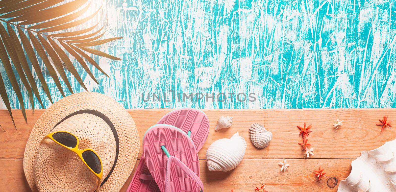 Beach hat, coconut leaves and glasses on pink background In the summer concept, copy space, top view, minimal style, Glasses beach