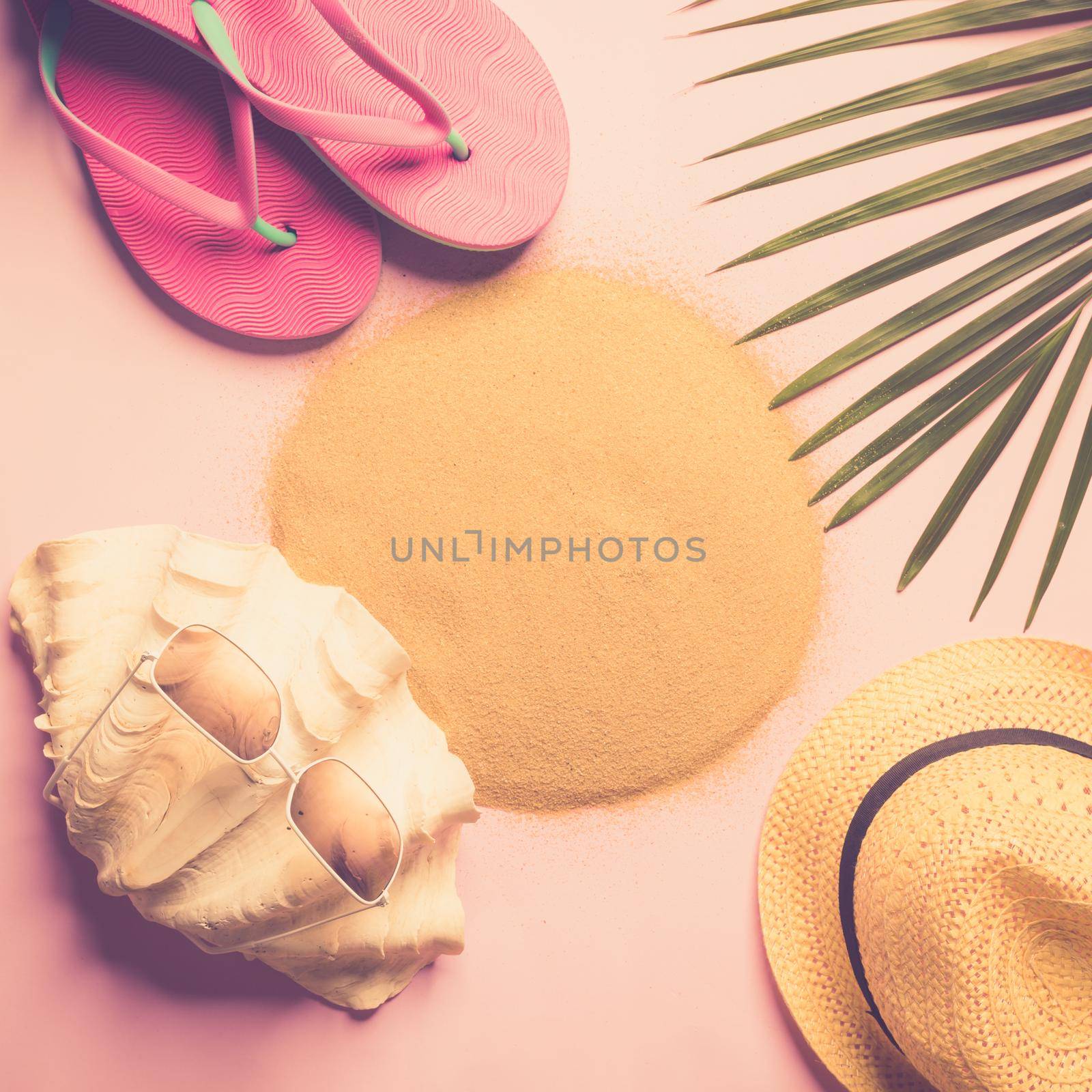 Beach hat, coconut leaves and glasses on pink background In the summer concept, copy space, top view, minimal style, Glasses beach