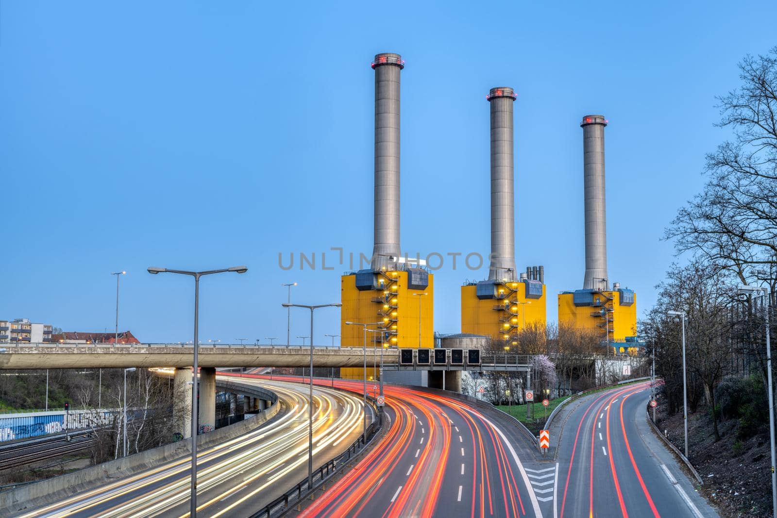 Power station and highway at twilight seen in Berlin, Germany