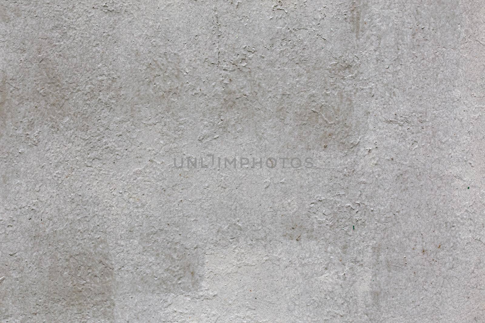 old cracked gray paint over steel sheet surface - flat texture and background