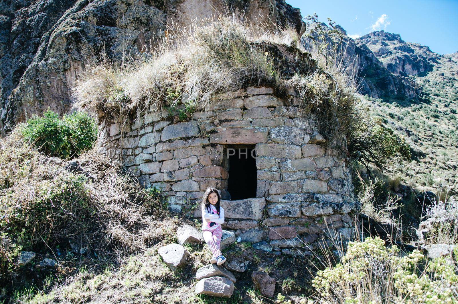 Tourist girl doing treks for pumacoto funerals in Canta - Peru