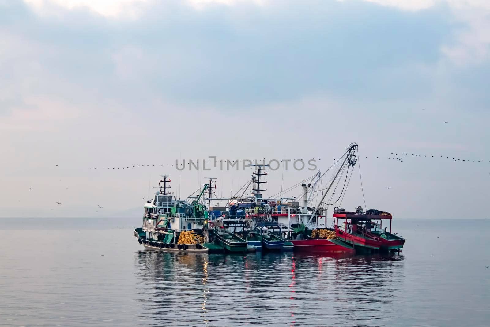istanbul,turkey-april 2,2021. fishing season and fishing boats at marmara sea in kumkapi district.