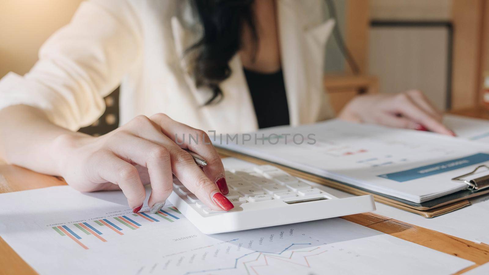 Close up view of bookkeeper or financial inspector hands making report, calculating or checking balance. Home finances, investment, economy, saving money or insurance concept
