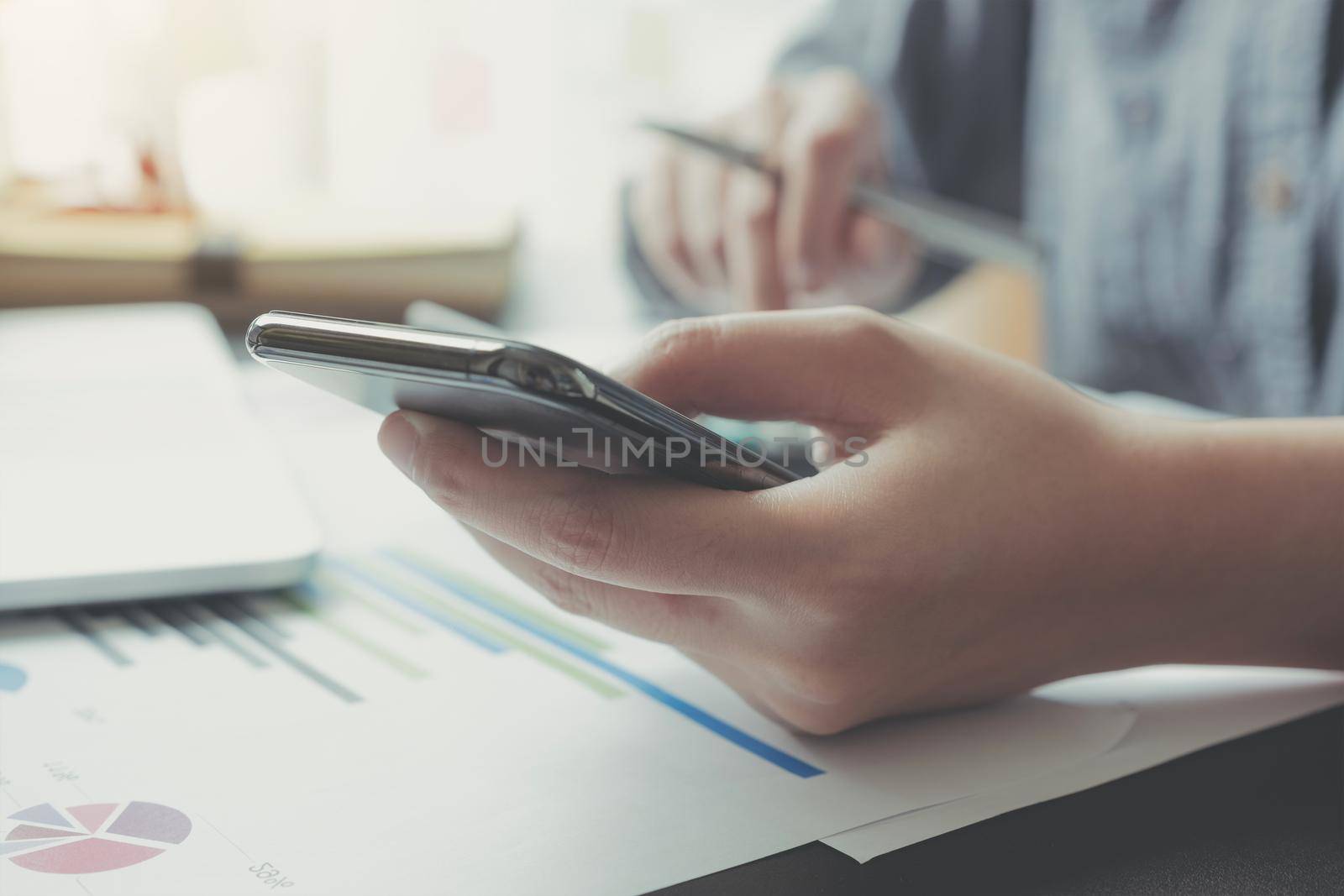 Business woman investment consultant analyzing company annual financial report balance sheet statement working with documents graphs. Concept picture of business, market, office, tax. by wichayada