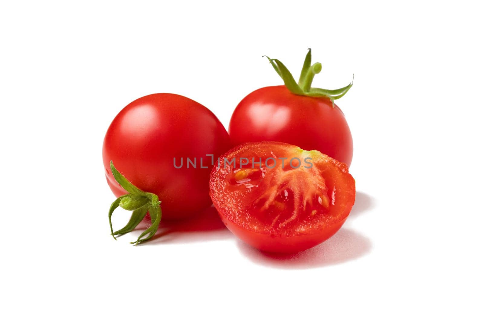 Several ripe cherry tomatoes isolated on white background by galsand