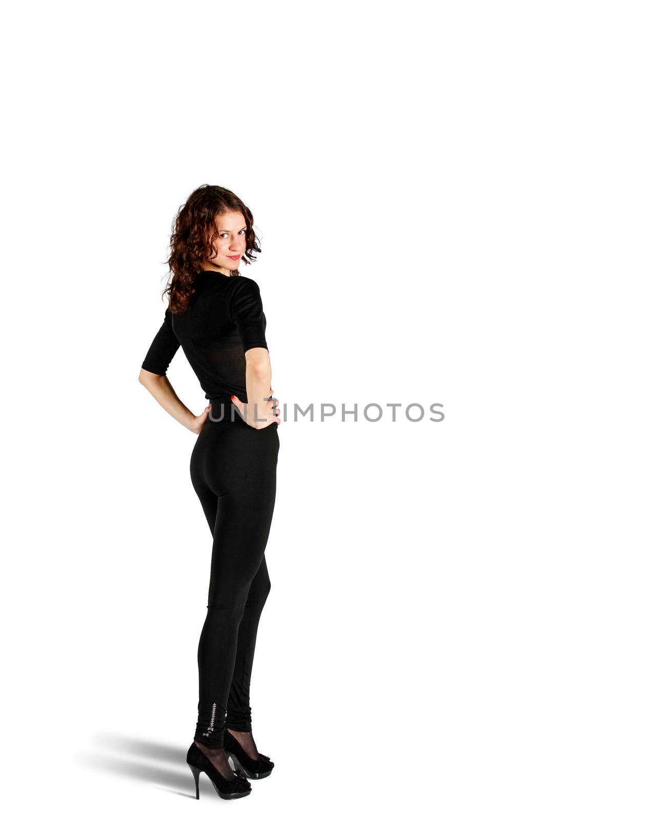 young beautiful woman in black suit posing standing by raddnatt