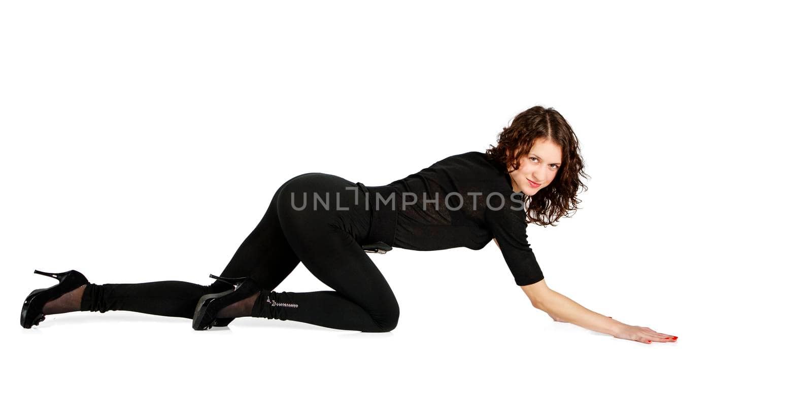 young beautiful woman in black suit posing standing on all fours by raddnatt