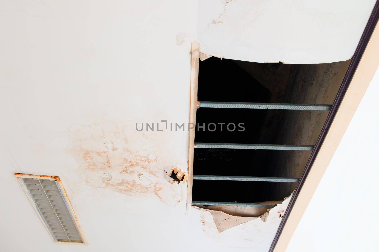 gypsum ceiling inside damaged by water leaking