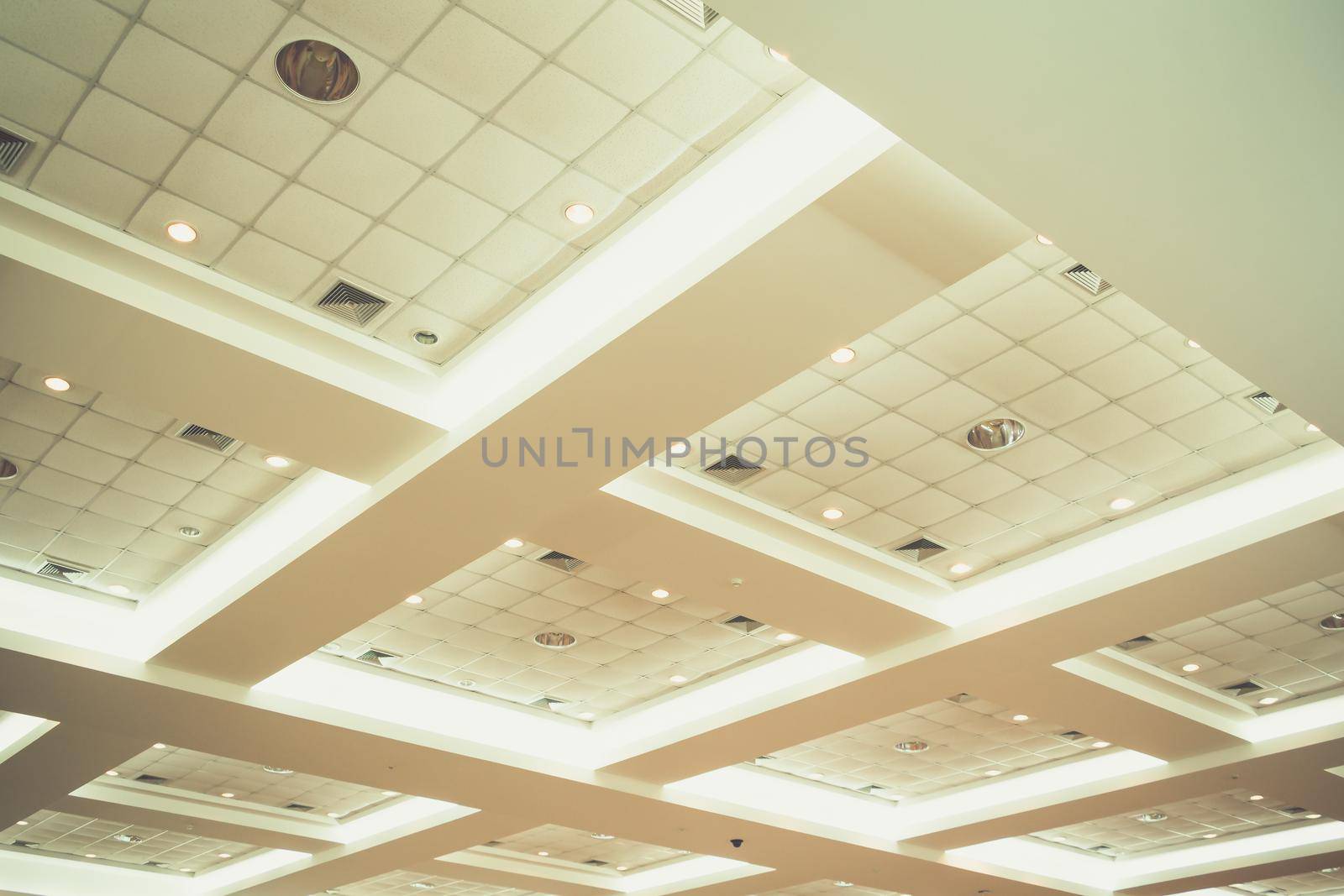 ceiling of business interior office building and light neon. vintage style tone with copy space add text by pramot