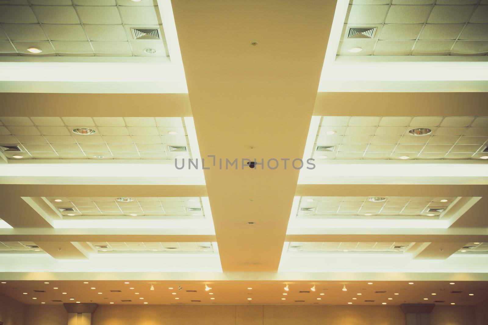 ceiling of business interior office building and light neon. vintage style tone with copy space add text