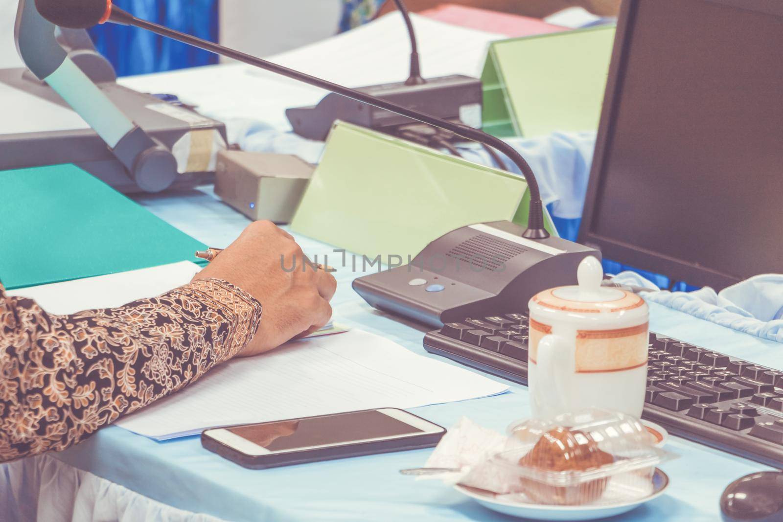 hands business and papers on table present a meeting seminar with copy space add text. warm retro tone color