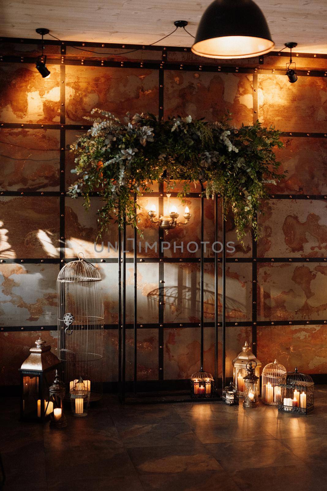 wedding ceremony area in brown oothenes with wood and rusty metal