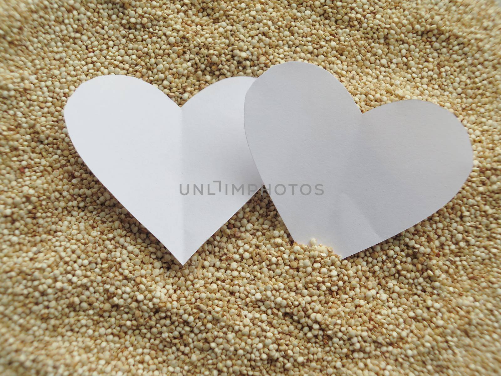 closeup of Heart shape on Raw cous cous semolina by aroas