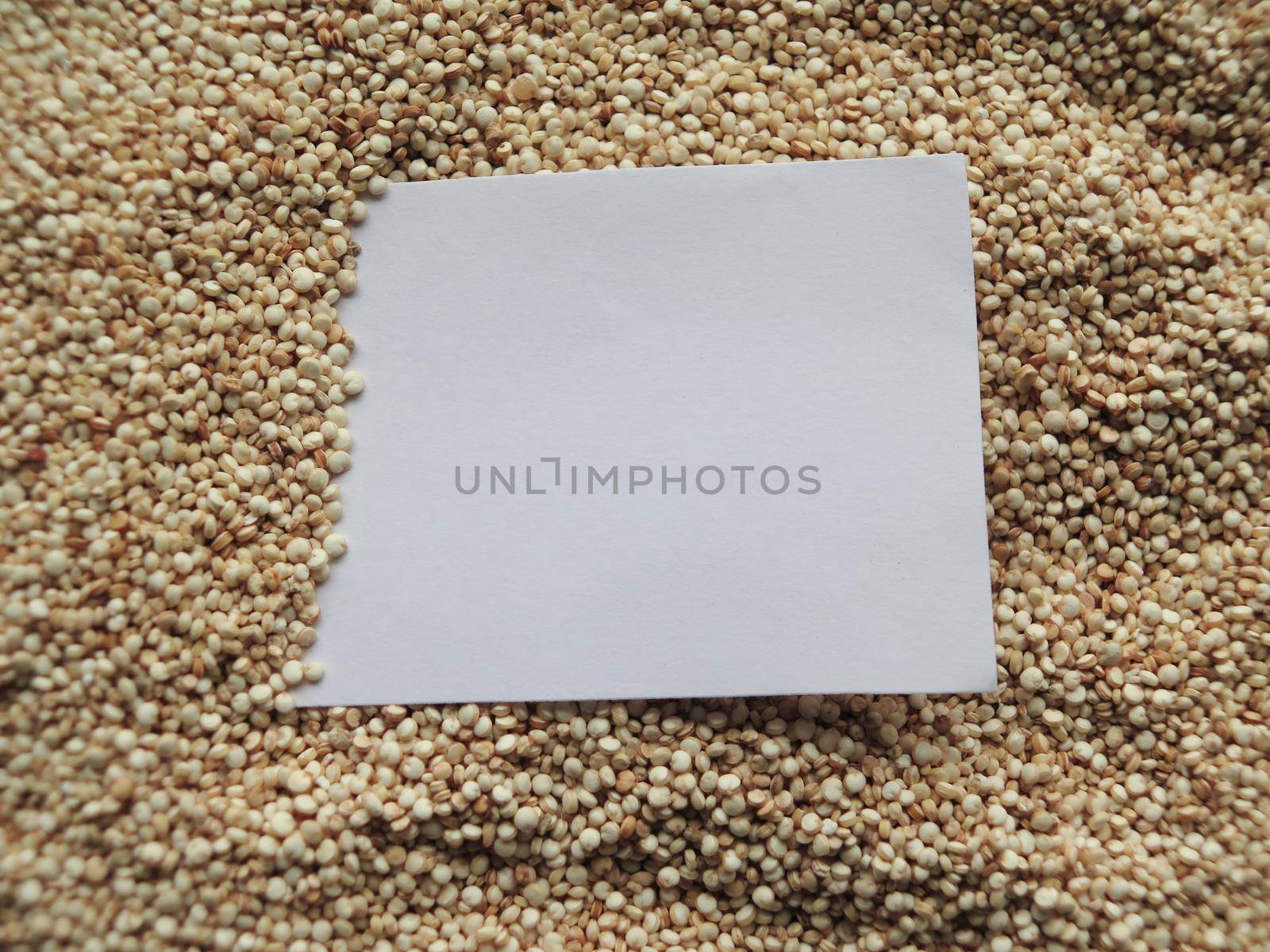 closeup white paper on raw cous cous semolina by aroas