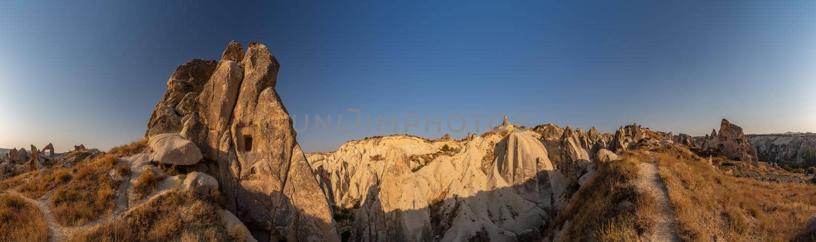 The picturesque panorama of Cappadocia at sunset, amazing Turkey, Mountains and rock formation, big size image, Goreme national park, Love valley, open air museum, ancient region of Anatolia, Unesco by vladimirdrozdin