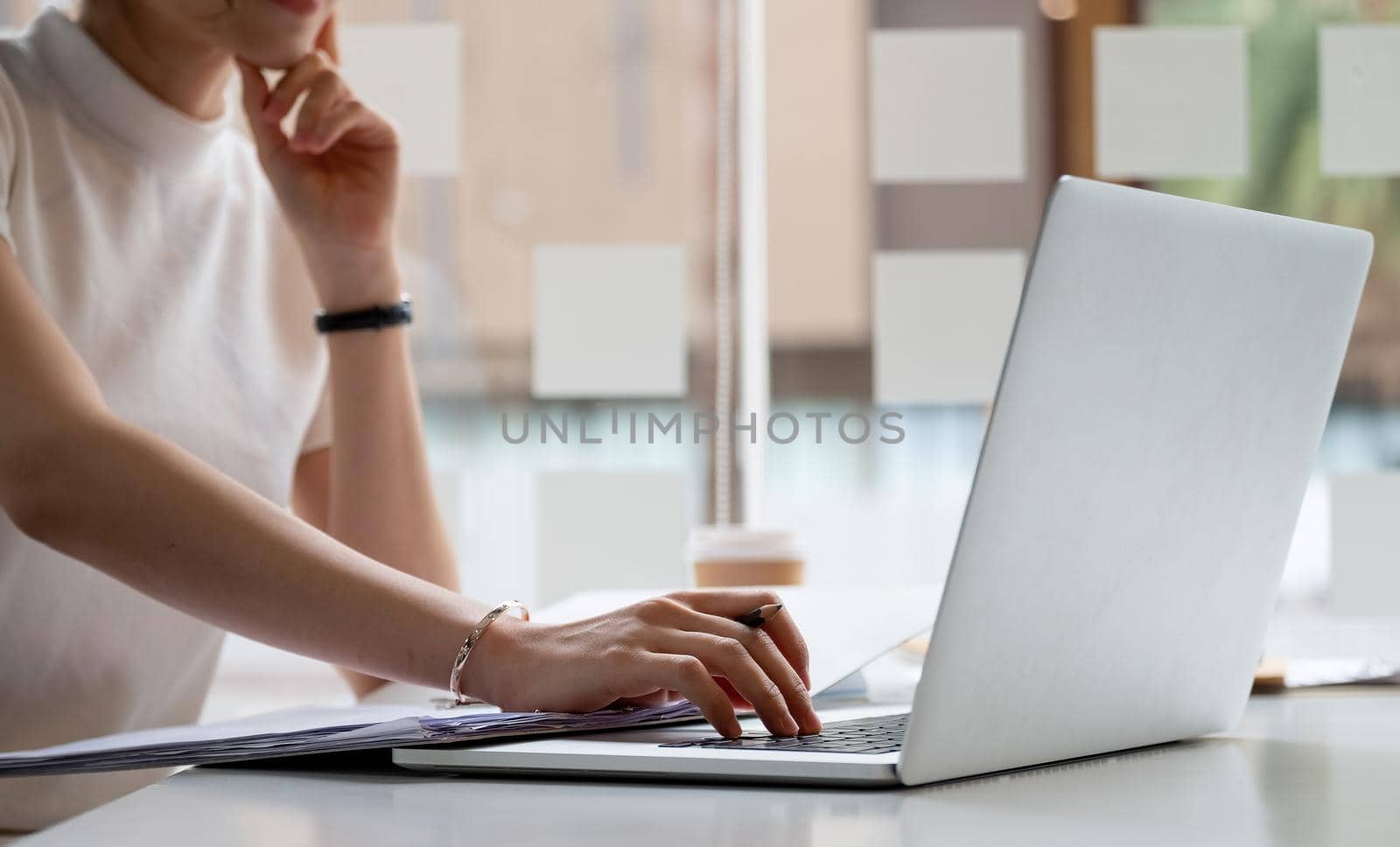 Close up hands of female employee using laptop at workplace, looking at screen, businesswoman preparing economic report, working online project, cheerful intern doing computer work, typing. by nateemee