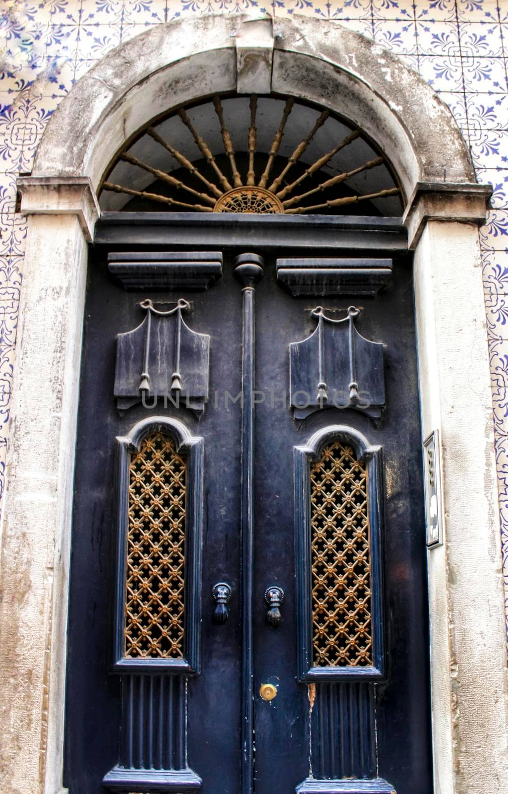 Old colorful doors in Lisbon by soniabonet