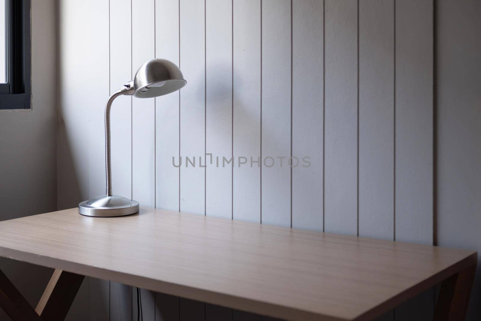 Workplace with space - Lamp on old wood table with space of rough cement wall in white color tone by nateemee