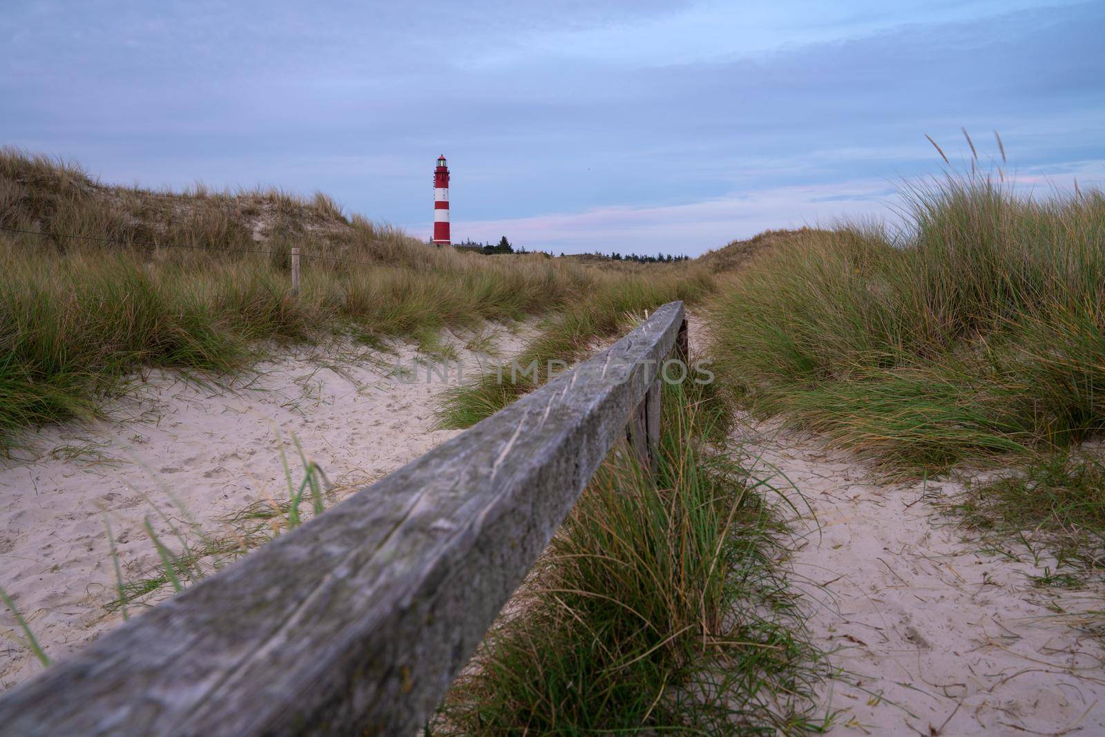 Panoramic image of the Wittduen lighthouse at sunset, Amrum, Germany