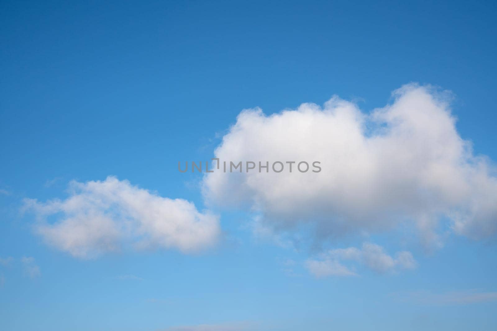 Low angle view to sky with cumulus clouds
