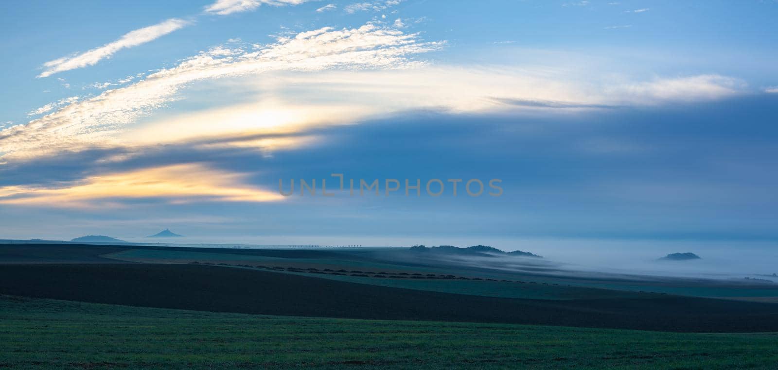 Landscape covered with fog in Central Bohemian Uplands, Czech Republic.  by CaptureLight