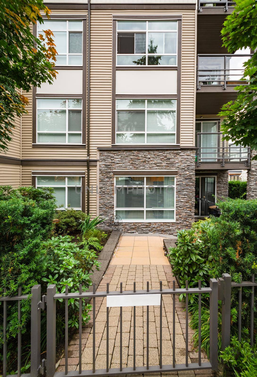 Private entrance at the appartment on ground level in low rise condominimum building