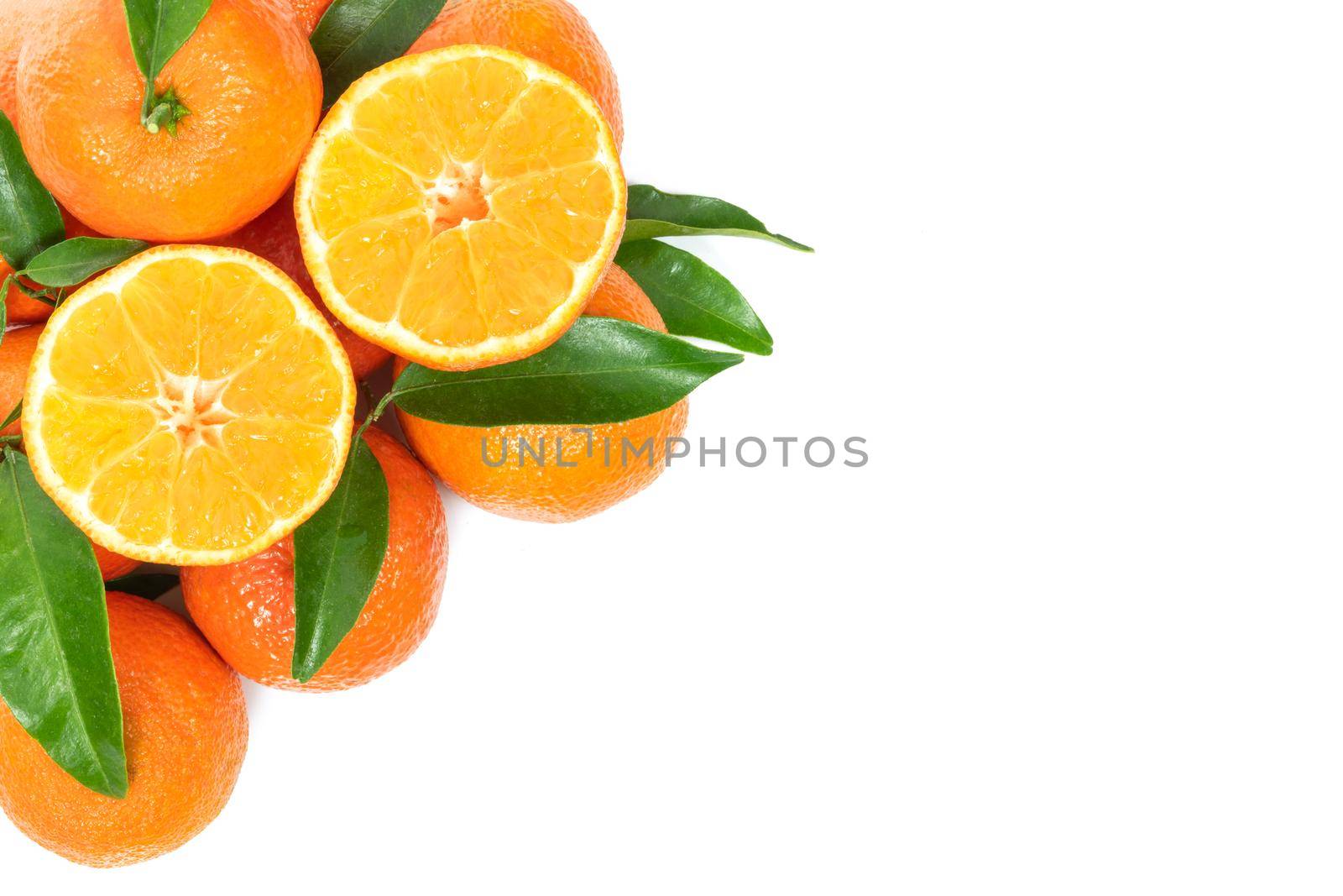 Tropical fruit composition - group of fresh oranges or tangerines  isolated on a white background with copy space