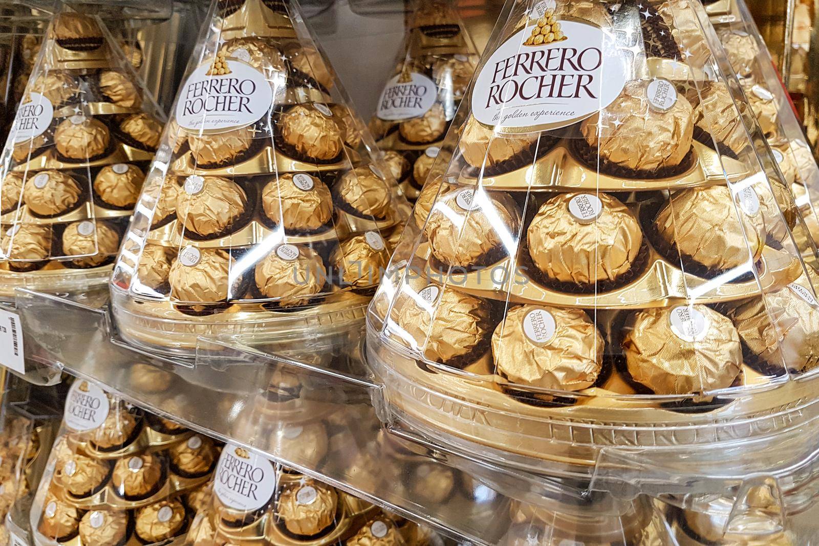 Nowy Sacz, Poland - December 07, 2018 : Ferrero Rocher premium chocolate on store shelf for sale in supermarket. Ferrero Rocher is a famous Italian chocolate produced.