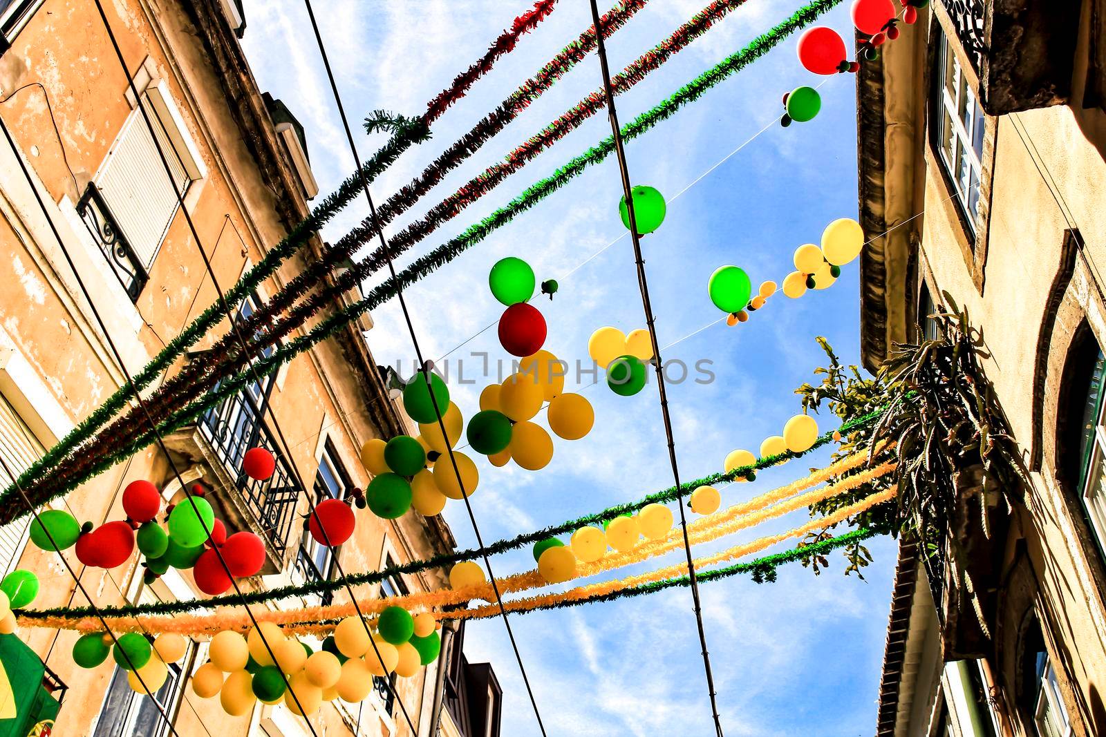 Streets adorned with garlands for the festivities of Saint Anthony in the Alfama neighborhood in Lisbon