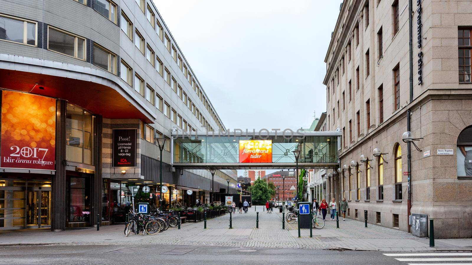 Malmo, Sweden - July 25, 2017:  Panoramic view of Stora Nygatan and Malmborgsgatan Street in the centre of Malmo in Sweden. Malmo is the largest city of Skane County and the third largest city in Sweden after Stockholm and Gothenburg.