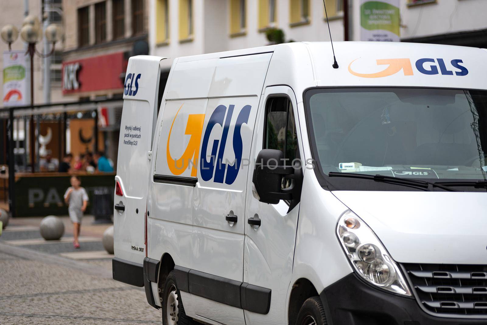 Wroclaw, Poland - July 20, 2017: GLS courier delivers shipments to the customer. GLS is one of the largest postal shipping company on the world.