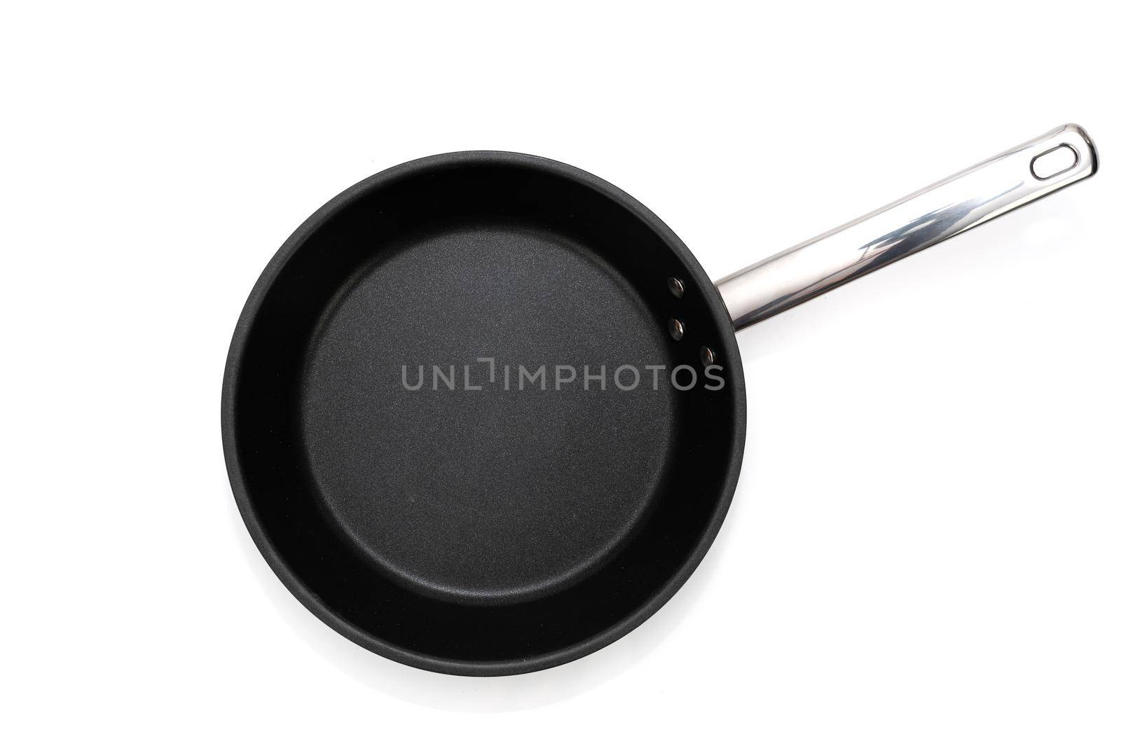 Black fry pan on white by wdnet_studio